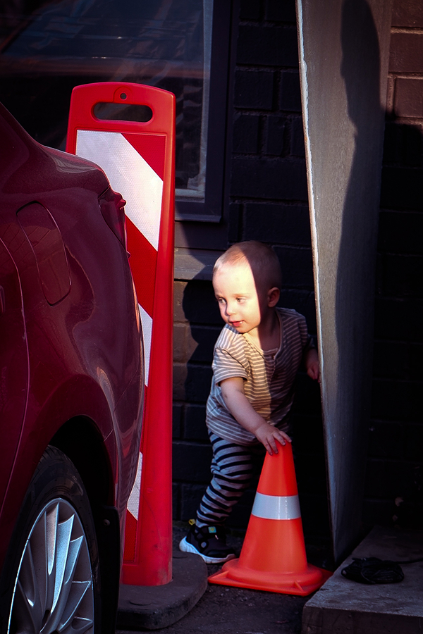 the boy with the traffic cone